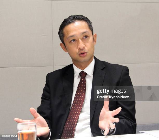 Kiyotaka Ando, CEO of Nissin Foods Co., talks in an interview at its office in Hong Kong on May 24 about marketing and sales strategy for vegetable...
