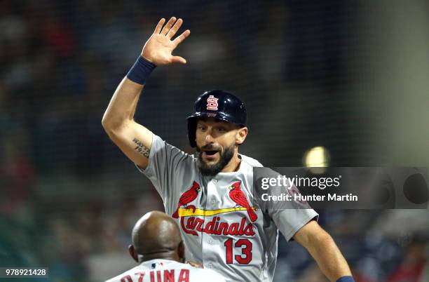 Matt Carpenter of the St. Louis Cardinals celebrates after hitting a go-ahead solo home run in the ninth inning during a game against the...