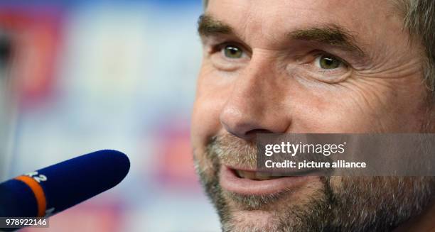 March 2018, Germany, Hamburg: Bernd Hollerbach, coach of the German Bundesliga soccer team Hamburger SV, speaking during a press conference on the...