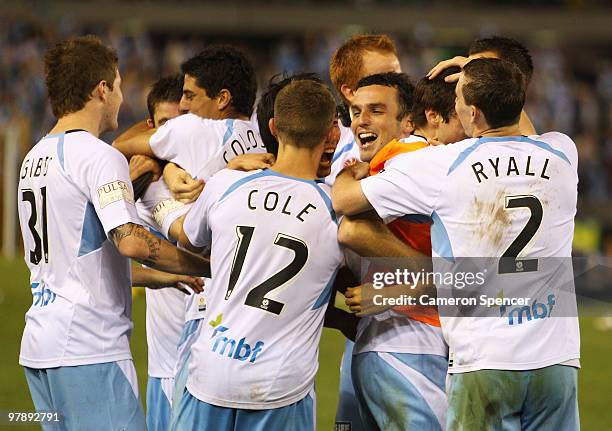 Sydney FC players celebrate winning the A-League Grand Final match between the Melbourne Victory and Sydney FC at Etihad Stadium on March 20, 2010 in...