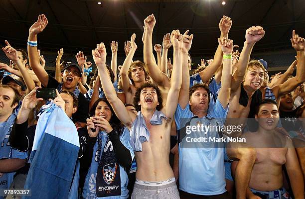 Sydney FC fans celebrate after the A-League Grand Final match between the Melbourne Victory and Sydney FC at Etihad Stadium on March 20, 2010 in...