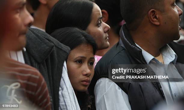 Nepalis queue to pay their last respects to former prime minister and Nepali Congress party president Girija Prasad Koirala in Kathmandu on March 20,...