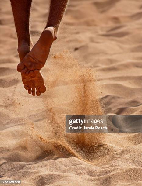 beach volleyball feet sand jump - beach volleyball feet stock pictures, royalty-free photos & images