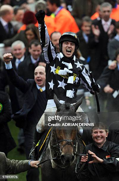 Imperial Commander ridden by Paddy Brennan celebrates in the Winners Enclosure after winning the Cheltenham Gold Cup on the final day of the...