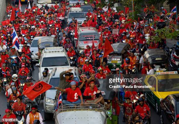 Thousands of Red shirt supporters of former PM Thaksin Shinawatra parade through the streets on March 20, 2010 in Bangkok,Thailand. They rolled...