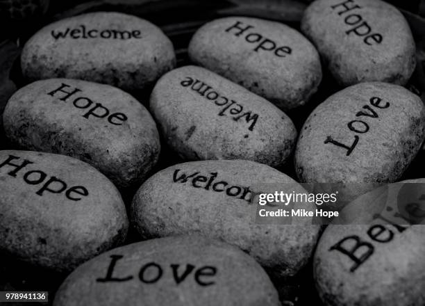 hope pebbles by mike hope - faith hope and love symbols stock pictures, royalty-free photos & images