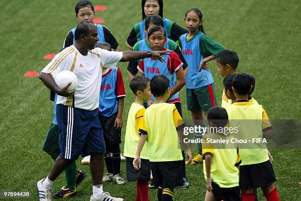 Nagenthiran of Singapore coaches children during the FIFA Grassroots Courses and Football Festivals held at the Jalan Besar Stadium on March 20, 2010...