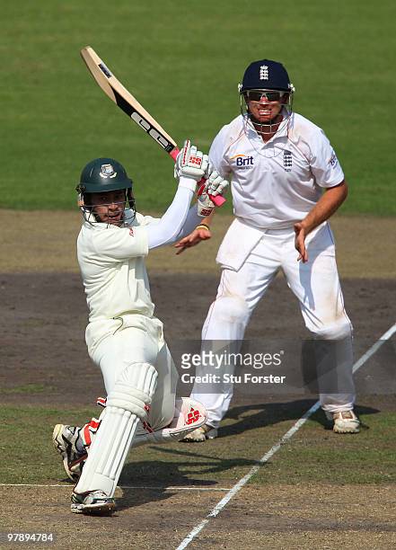 Bangladesh batsman Mushfiqur Rahim picks up some runs watched by Ian Bell during day one of the 2nd Test match between Bangladesh and England at...