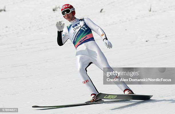 Ohan Remen Evensen of Norway reacts after the final jump during the individual event of the Ski jumping World Championships on March 20, 2010 in...