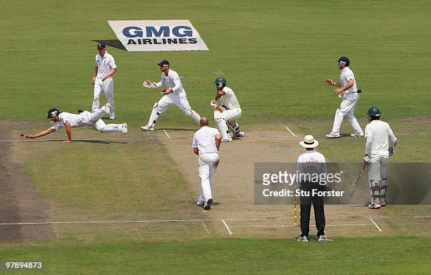 England captain Alastair Cook dives in the vain attempt to take a catch watched by wicketkeeper Matt Prior during day one of the 2nd Test match...