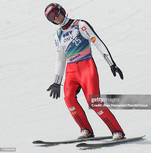 Robert Kranjec of Slovenia reacts after the final jump during the individual event of the Ski jumping World Championships on March 20, 2010 in...