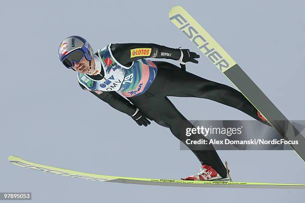 Adam Malysz of Poland soars through the air during the individual event of the Ski jumping World Championships on March 20, 2010 in Planica, Slovenia.