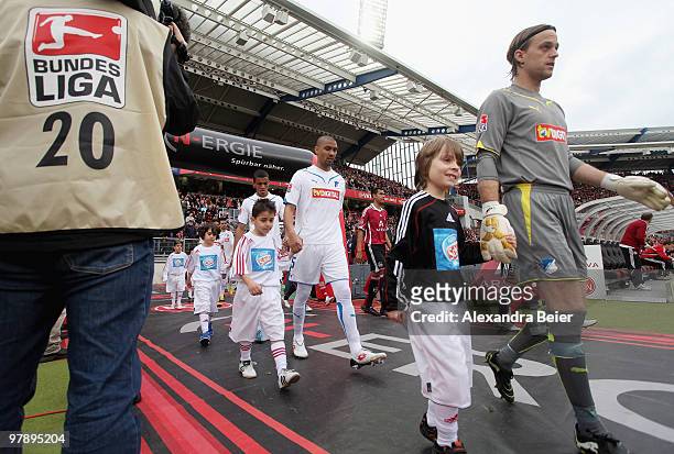 Goalkeeper Timo Hildebrand and his team mates of Hoffenheim enter the pitch for the Bundesliga match between 1. FC Nuernberg and 1899 Hoffenheim at...