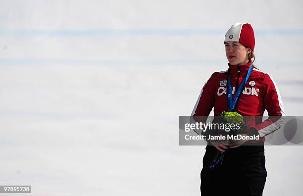 Gold medalist Lauren Woolstencroft of Canada celebrates at the medal ceremony for the Women's Standing Super-G during Day 8 of the 2010 Vancouver...