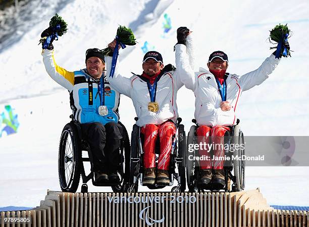 Bronze medalist Taiki Morii of Japan , gold medalist Akira Kano of Japan and silver medalist Martin Braxenthaler of Germany celebrate at the medal...
