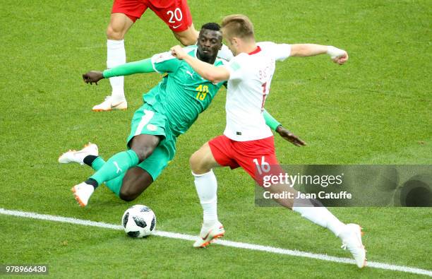Baye Niang of Senegal, Jakub Baszczykowski of Poland during the 2018 FIFA World Cup Russia group H match between Poland and Senegal at Spartak...