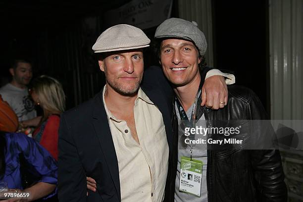 Actors Woody Harrelson and Matthew Mcconaughey listen to John Popper perfom at the Bliss Lounge Party benefitting the H.O.P.E. Charity at Big Red Sun...