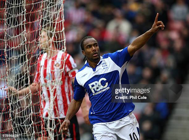 Cameron Jerome of Birmingham City celabrates scoing during the Barclays Premier League match between Sunderland and Birmingham City at the Stadium of...