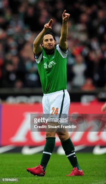 Claudio Pizzaro of Bremen celebrates scoring his goal during the Bundesliga match between SV Werder Bremen and VfL Bochum at Weser Stadium on March...
