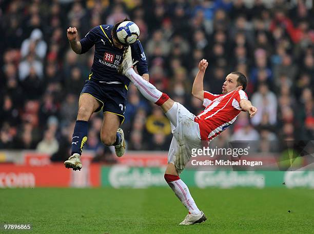 Matthew Etherington of Stoke and Vedran Corluka of Tottenham battle for the ball during the Barclays Premier League match between Stoke City and...
