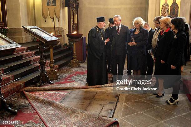 Prince Charles, Prince of Wales and Camilla, Duchess of Cornwall are shown the secret passage to the crypt as they visit the Orthodox Cathederal of...
