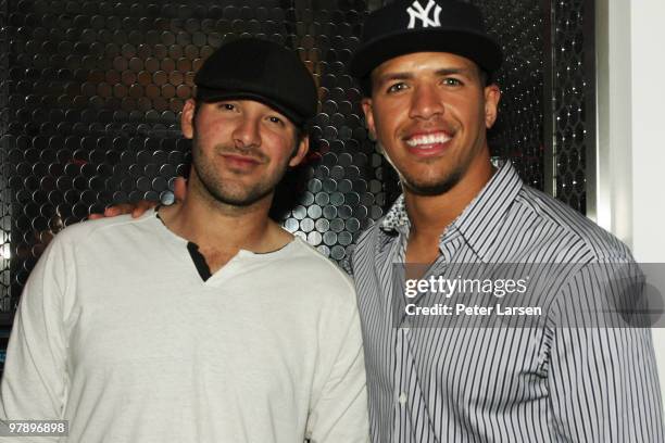 Tony Romo and Miles Austin attend the Bacardi After Party With The Black Eyed Peas at Ghost Bar on March 19, 2010 in Dallas, Texas.