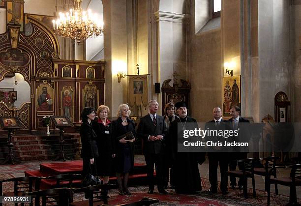 Prince Charles, Prince of Wales and Camilla, Duchess of Cornwall listen to choir music as they visit the Orthodox Cathederal of Saints Cyril and...