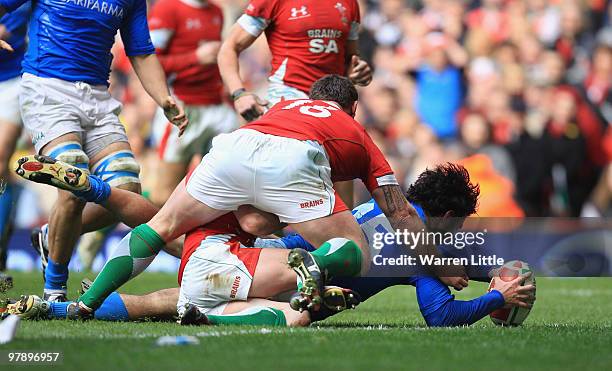 Luke McLean of Italy dives over to score a try during the RBS Six Nations Championship match between Wales and Italy at Millennium Stadium on March...