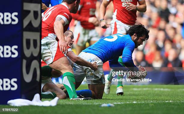 Luke McLean of Italy dives over to score a try during the RBS Six Nations Championship match between Wales and Italy at Millennium Stadium on March...