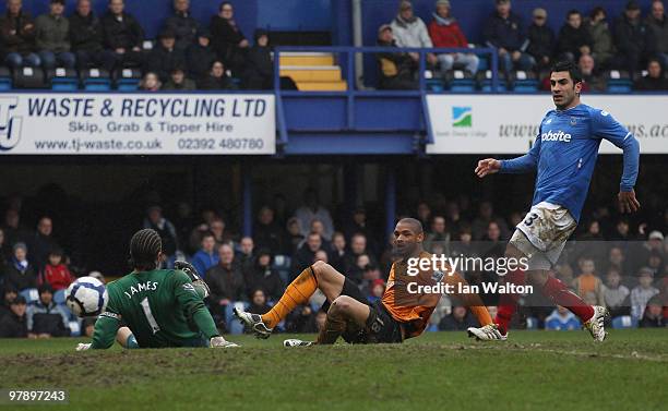 Caleb Folan of Hull City scores past goalkeeoer David James during the Barclays Premier League match between Portsmouth and Hull City at Fratton Park...