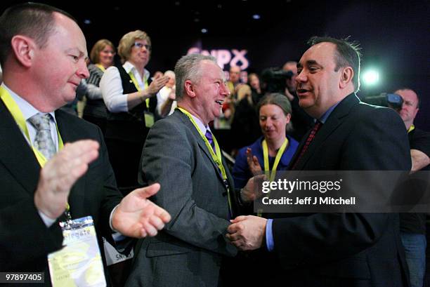 Alex Salmond Scottish National Party leader takes applause after giving his key note speech at the party conference on March 20, 2010 in Aviemore,...