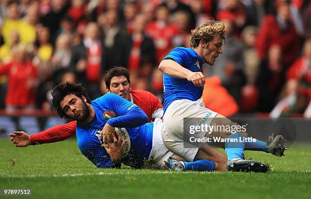 Luke McLean of Italy covers the ball on the try line during the RBS Six Nations Championship between Wales and Italy at Millennium Stadium on March...