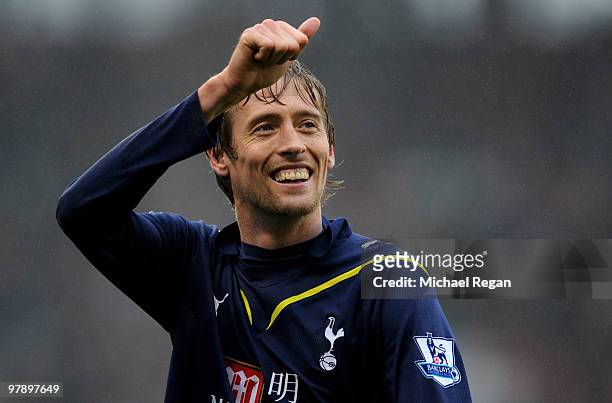 Peter Crouch of Tottenham smiles at fans after his team's victory of the Barclays Premier League match against Stoke City at the Britannia Stadium on...