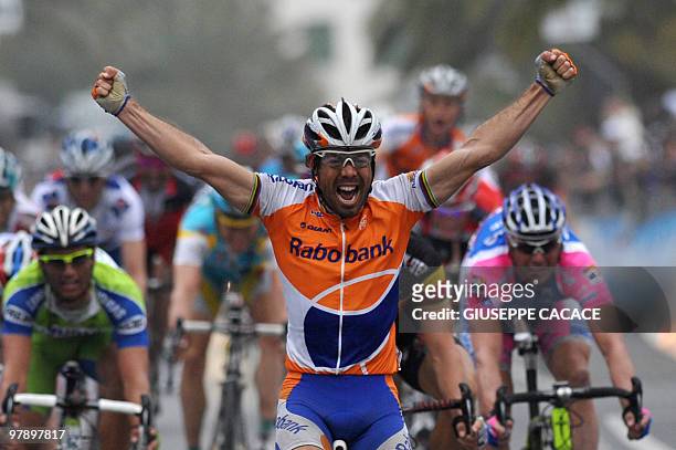 Spain's Oscar Freire crosses the finish line of the 101st Milan SanRemo spring classic in victory on March 20, 2010 in San Remo. The 34-year-old...