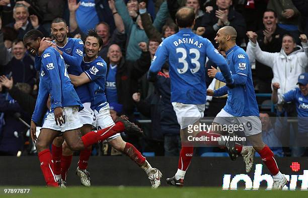 Kanu of Portsmouth celebrates scoring the winning goal during the Barclays Premier League match between Portsmouth and Hull City at Fratton Park on...