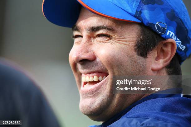 Kangaroos head coach Brad Scott reacts during a North Melbourne Kangaroos AFL training session at Arden Street on June 20, 2018 in Melbourne,...
