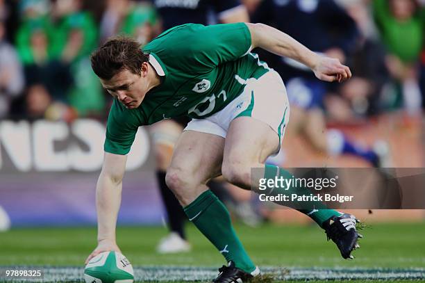 Brian O'Driscoll of Ireland scores the first try during the RBS Six Nations match between Ireland and Scotland at Croke Park on March 20, 2010 in...