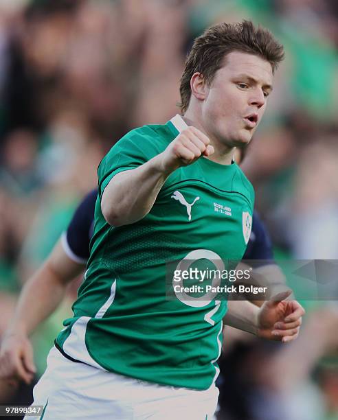 Brian O'Driscoll of Ireland celebrates after scoring the first try during the RBS Six Nations match between Ireland and Scotland at Croke Park on...