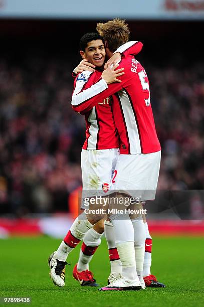 Denilson of Arsenal celebrates scoring the opening goal with Nicklas Bendtner during the Barclays Premier League match between Arsenal and West Ham...