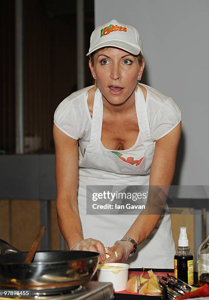 Charity campaigner Heather Mills demonstrates her vegetarian cookery during the Brighton Eco Veggie Fayre at The Hove Centre on March 20, 2010 in...