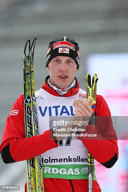 Dominik Landertinger cheers after the men's pursuit in the E.On Ruhrgas IBU Biathlon World Cup on March 20, 2010 in Oslo, Norway.