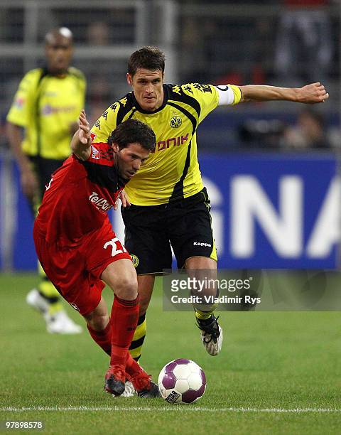 Gonzalo Castro of Leverkusen and Sebastian Kehl of Dortmund battle for the ball during the Bundesliga match between Borussia Dortmund and Bayer...