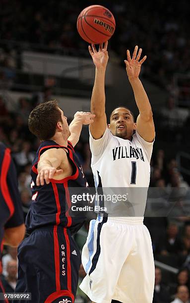 Scottie Reynolds of the Villanova Wildcatstakes a shot as Mickey McConnell of the Saint Mary's Gaels defends during the second round of the 2010 NCAA...