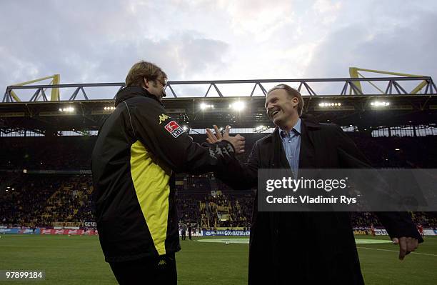 Dortmund coach Juergen Klopp shakes hand with Borussia Dortmund CEO Hans-Joachim Watzke ahead the Bundesliga match between Borussia Dortmund and...