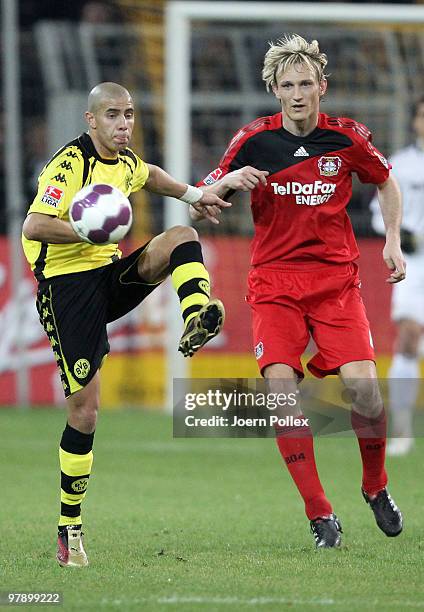 Mohamed Zidan of Dortmund and Sami Hyypiae of Leverkusen compete for the ball during the Bundesliga match between Borussia Dortmund and Bayer...