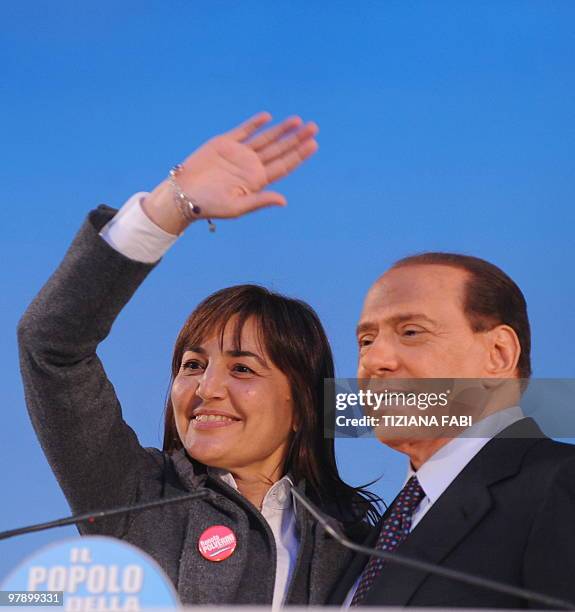 Italian Prime Minister and President of the PDL Silvio Berlusconi and PDL candidate for the Lazio region Renata Polverini addresse supporters during...