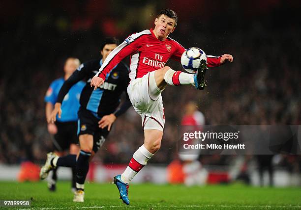 Andrei Arshavin of Arsenal controls the ball during the Barclays Premier League match between Arsenal and West Ham United at Emirates Stadium on...