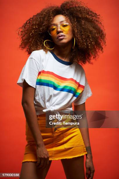 beautiful young woman with afro, reggaeton musician. - estilo de cabelo imagens e fotografias de stock