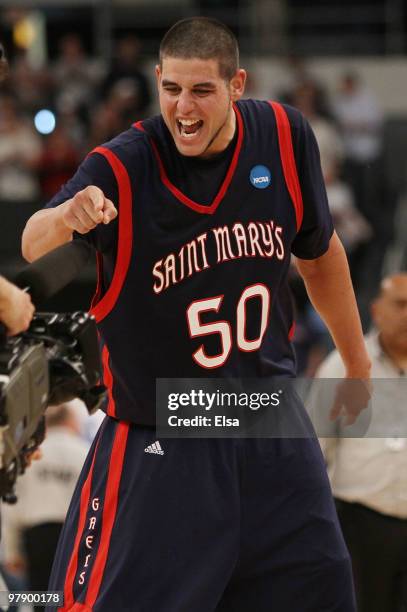 Omar Samhan of the Saint Mary's Gaels celebrates after the win over the Villanova Wildcats during the second round of the 2010 NCAA men's basketball...
