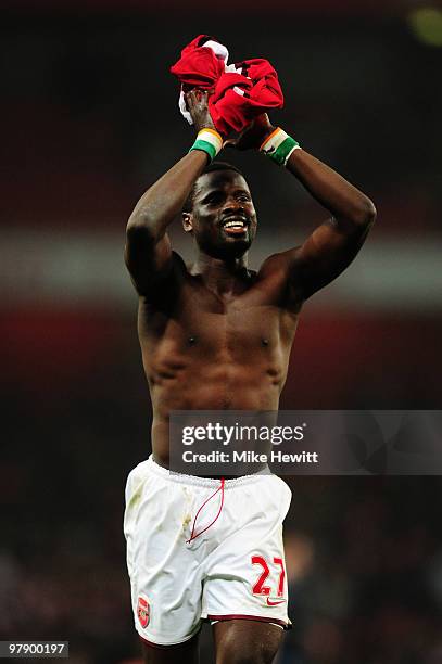 Emmanuel Eboue of Arsenal waves to the fans after the Barclays Premier League match between Arsenal and West Ham United at Emirates Stadium on March...